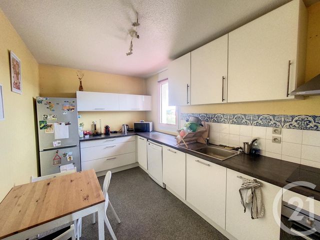 Appartement F4 à louer - 4 pièces - 100.52 m2 - BEAUMONT - 63 - AUVERGNE - Century 21 Stéphane Roume Immobilier